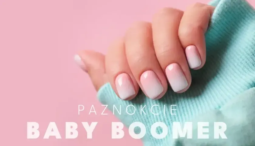 Delikatny manicure baby boomer na krótkich paznokciach, z subtelnym przejściem od różu do bieli.