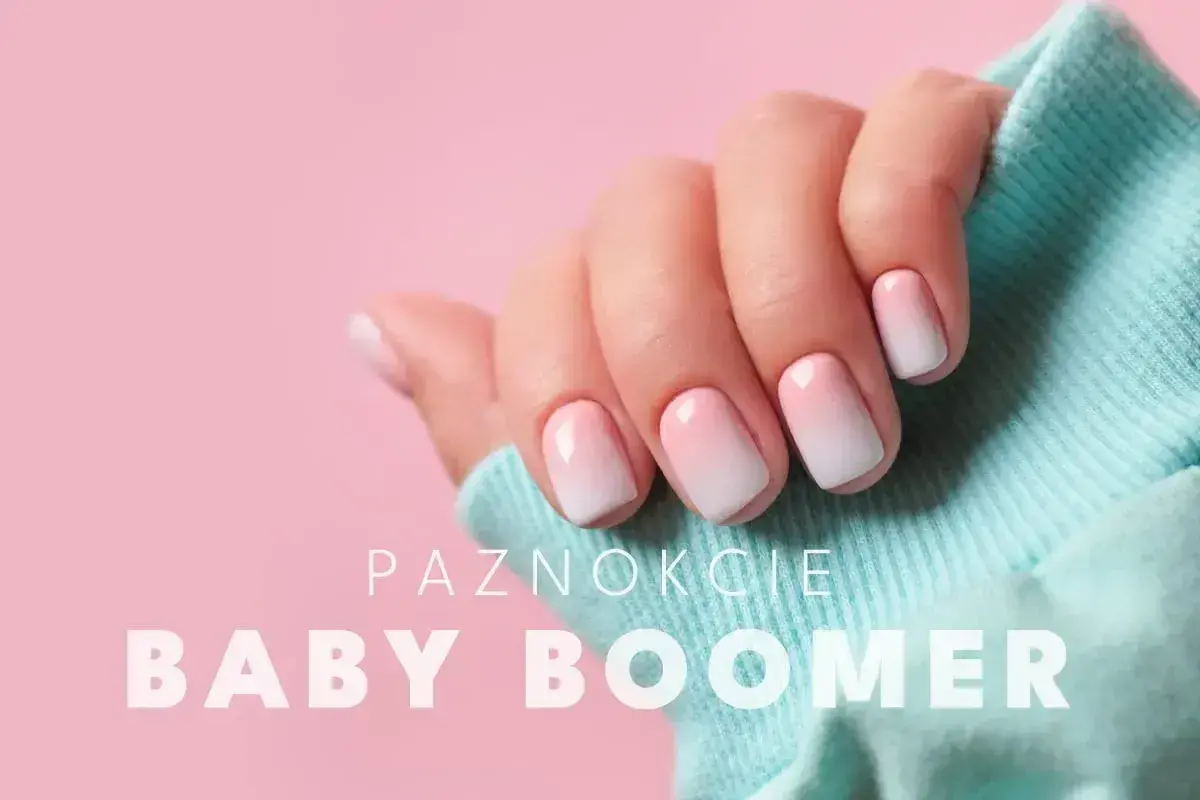 Delikatny manicure baby boomer na krótkich paznokciach, z subtelnym przejściem od różu do bieli.